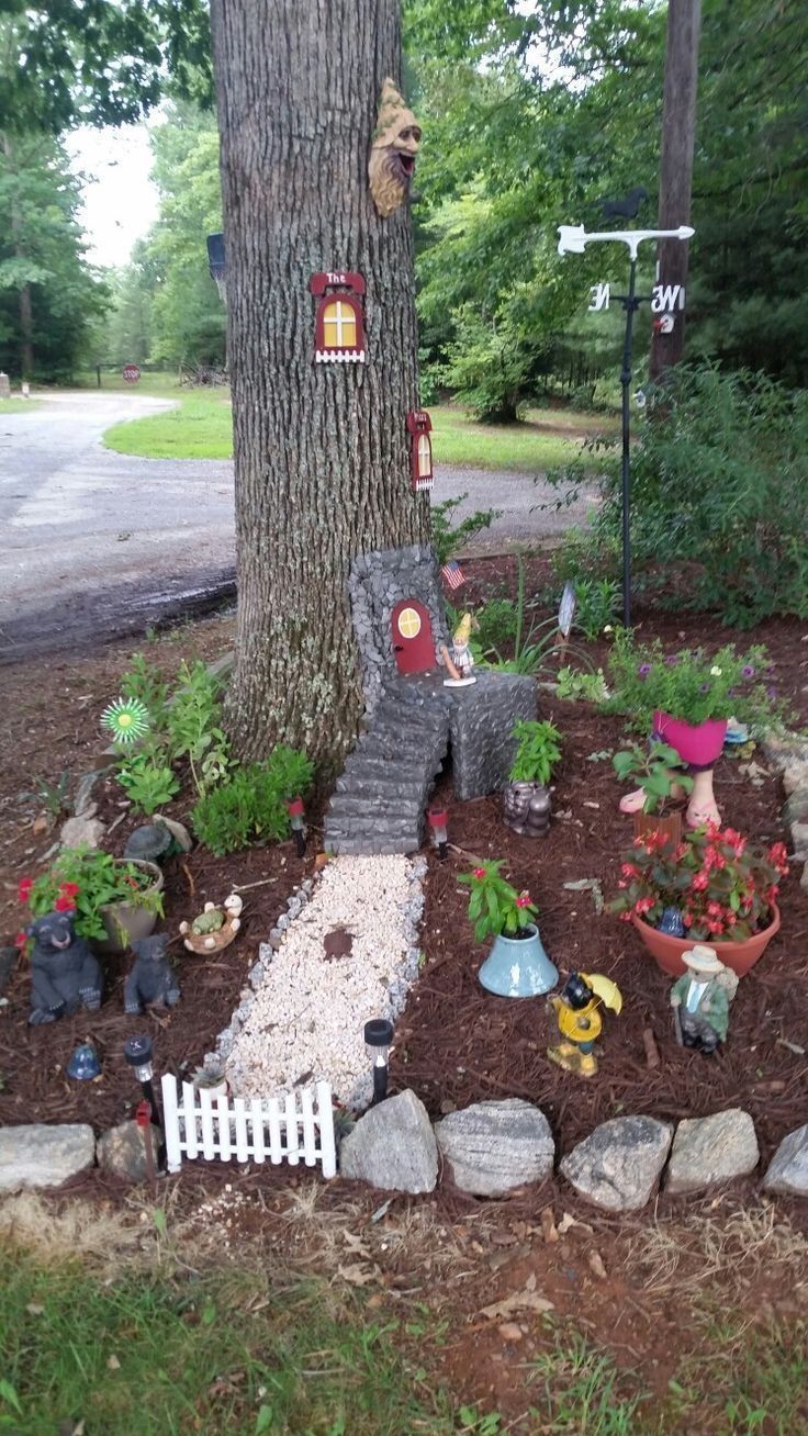 20+ Inspiring Gnome Garden And Fairy Garden Design Ideas To Copy Right Now - They’re becoming increasingly popular and more and more people love that new addition in their house or backyard.A Fairy Garden is basically a miniature garden made of natural materials such as pebbles, wood and living plants. It’s meant to be an enchanted green scene where live tiny magical creatures such as Fairies, but also gnomes, dwarfs, elves etc. supposed to bring good luck to your home. Large Fairy Garden, Fairy Garden Crafts, Diy Fairy, Garden Art, Diy Garden, Garden Types, Fairy Gardening, Flower Garden, Garden Yard Ideas