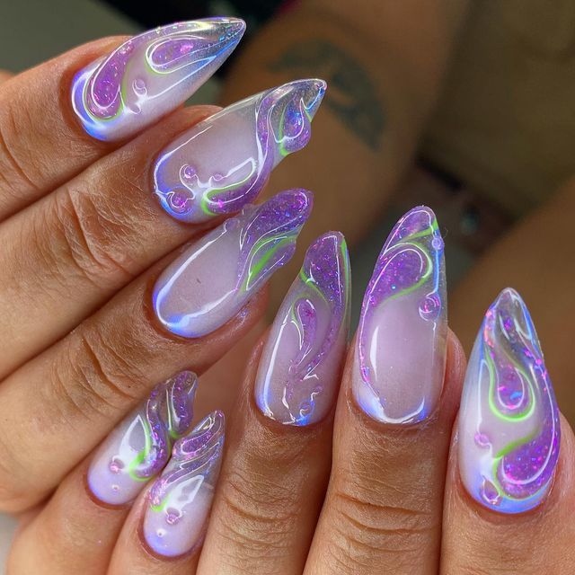 ⚡SUGAMAMA - NAIL ARTIST⚡STRASBOURG on Instagram: "FLORA des WINX 🧚 mood pour @helene.humbert Premier set à l’airbrush qui est vite monté crescendo 😈 @thegelbottlefrance PURPLE GLASS SWEET PEA RUBBER TOP #3dnailart #3dnails #purplenails #airbrushnails #glitternails #stiletto ##auroranails #thegelbottle #nailart #nailporn #naildesign #onglestrasbourg #nailartstrasbourg" Nail Design Stiletto, Nail Design Glitter, Classy Acrylic Nails, Best Acrylic Nails, Makeup Nails, Gel Nails, Polish Nails, Aurora Nails, Airbrush Nails