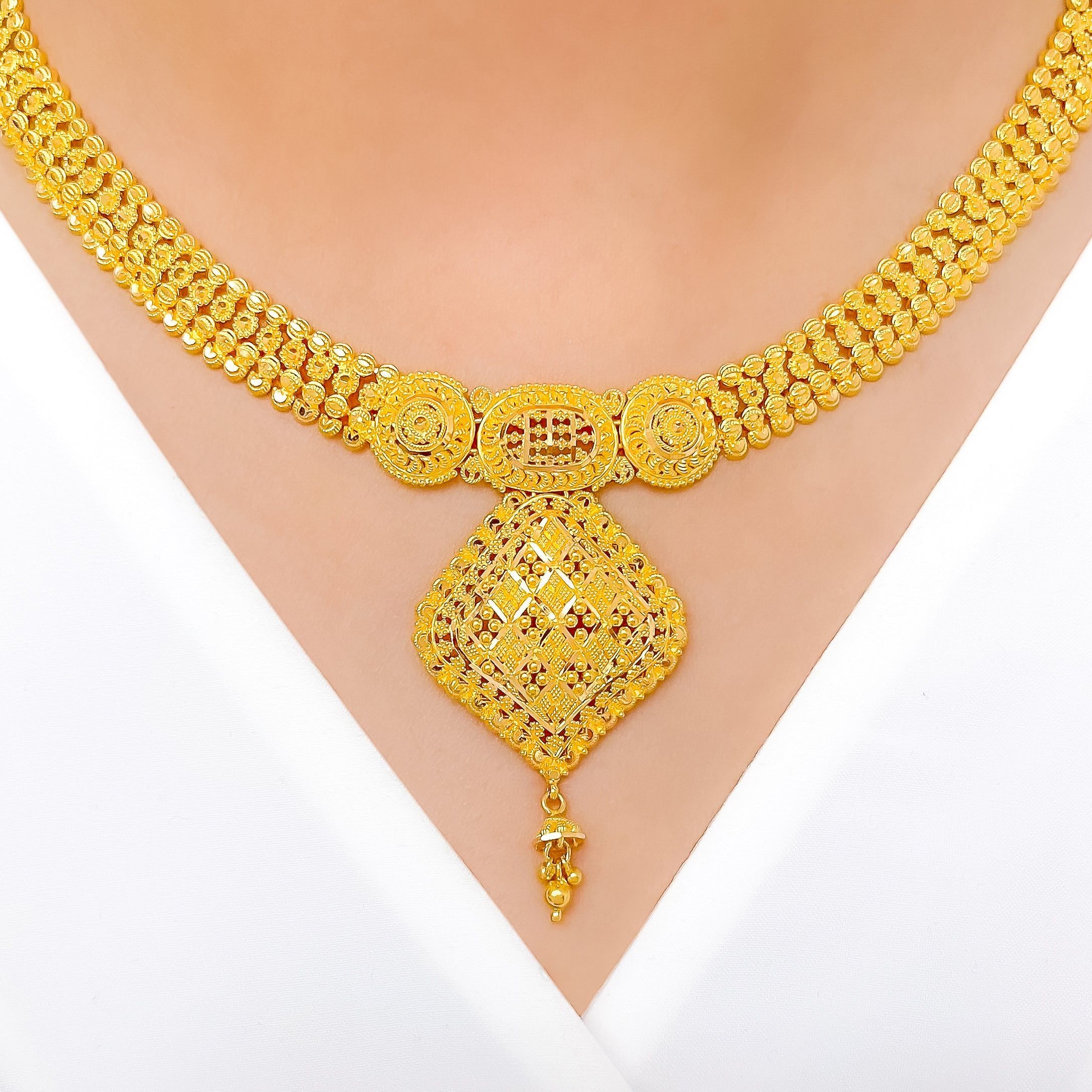 PRODUCT DETAILS Gold Purity(karat): 22k Gold Weight(grams): 37.3 Item Finish: Yellow Gold Set Length: 17.5" Drop Length: 1.8" Adjustable Links: 0.75" Links Lock Style: Hook Lock Matching Earrings: Included Earring Length: 1.75" Earring Post: Screw Back Lock Style, Yellow Gold Setting, 22k Gold, Matching Earrings, Purity, Post Earrings, Karat, Ornate, Tassels