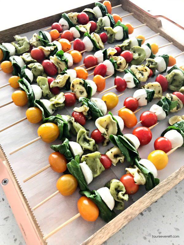 Easy to assemble pesto tortellini skewers. These tortellini skewers make for a g...