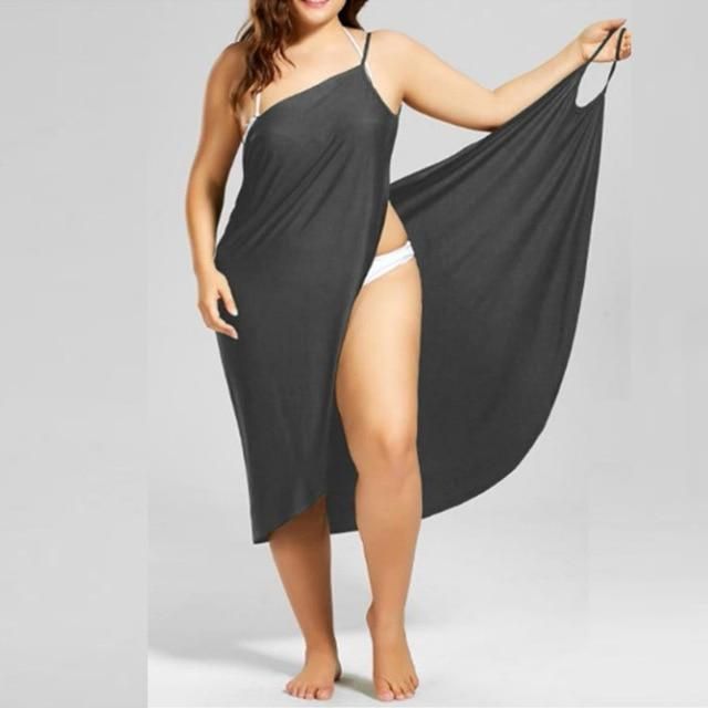 Brand Name: HalouWindMaterial: PolyesterStyle: BohemianSilhouette: LoosePattern Type: SolidSleeve Length(cm): SleevelessDecoration: NONEDresses Length: Mid-CalfSleeve Style: Spaghetti StrapWaistline: NaturalNeckline: V-NeckSeason: SummerModel Numb...