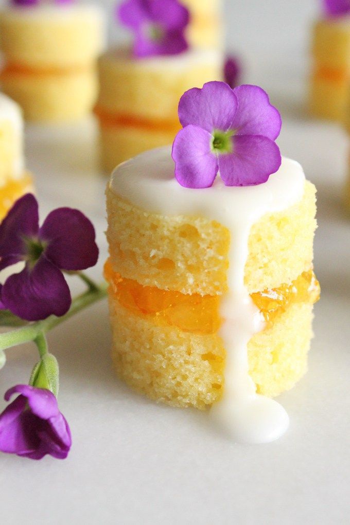 These mini naked cakes filled with sweet and tangy orange marmalade and garnished with fresh flowers are an elegant treat for a springtime brunch. They may look fancy, but they're simple to make. Mini Desserts, Just Desserts, Cake Desserts, Elegant Desserts, Fancy Desserts Recipes, Party Recipes, Mini Cake Recipes, Fancy Easter Desserts, Brunch Recipes