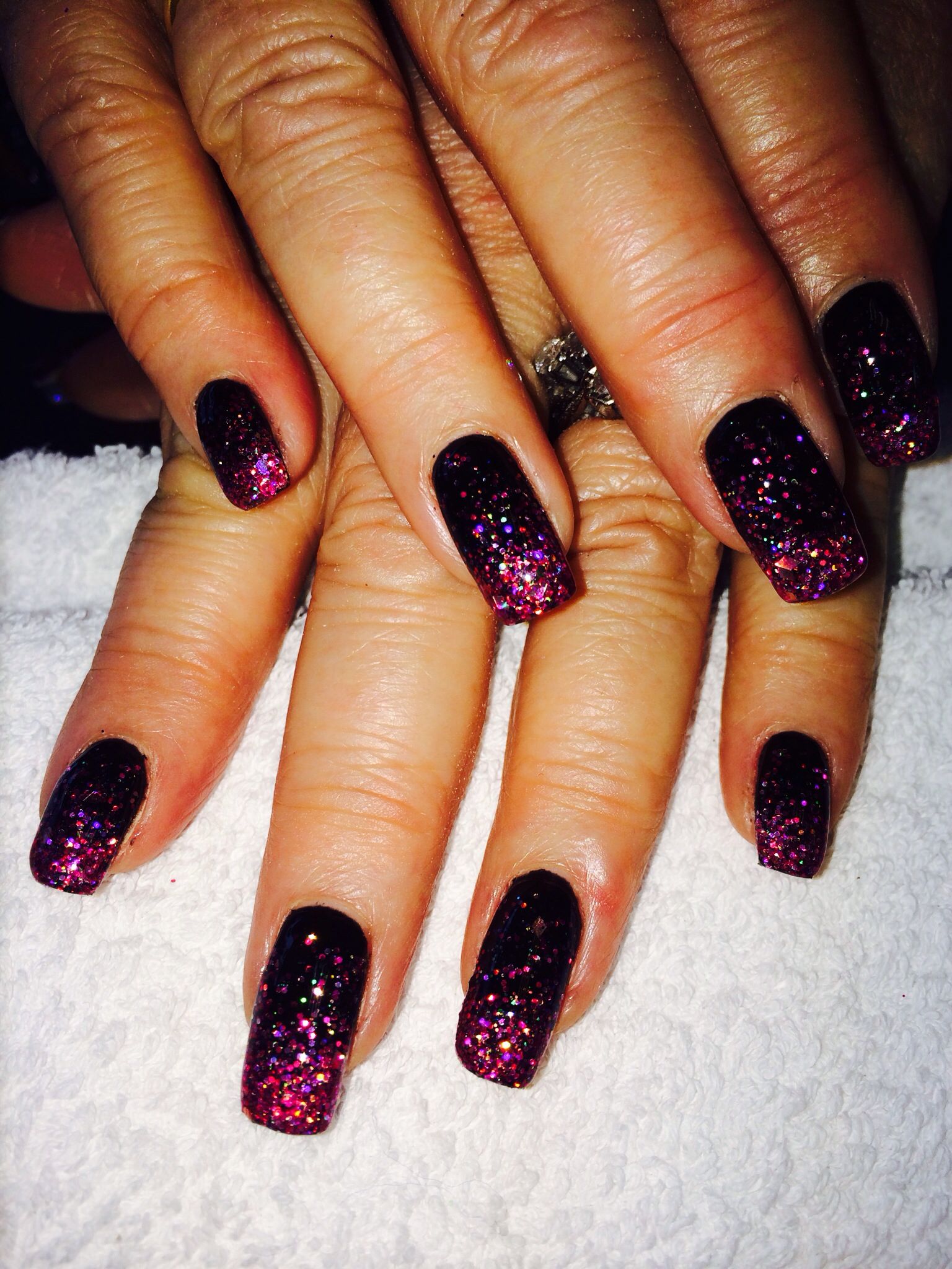 fabulous black bio sculpture gel nails with pink faded glitter