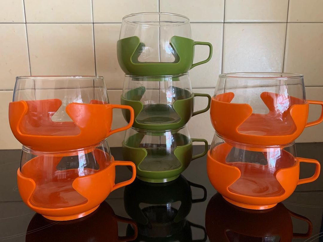 Four Glass Cups Are Stacked On Top Of Each Other With One Cup In The four-glass-cups-are-stacked-on-top-of-each-other-with-one-cup-in-the