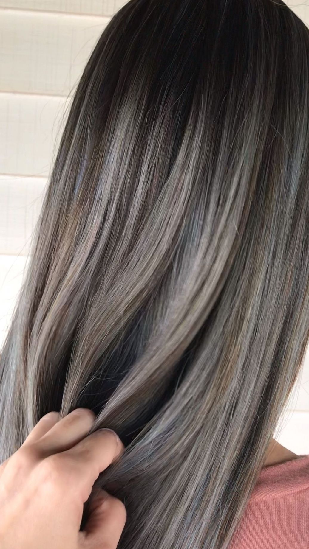 Silver ash blonde balayage on long black hair Silver ash blonde balayage on long black hair