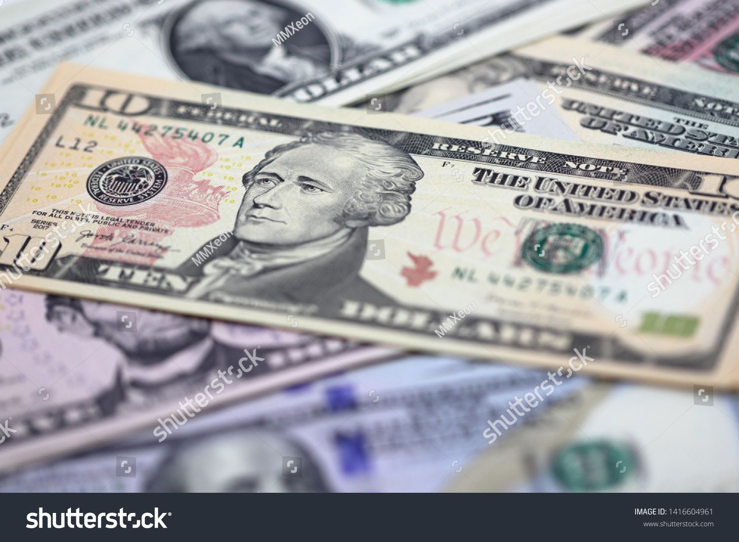 Pile Of 20 Us Dollar Bills Stack Over Other Value Of Us Dollars