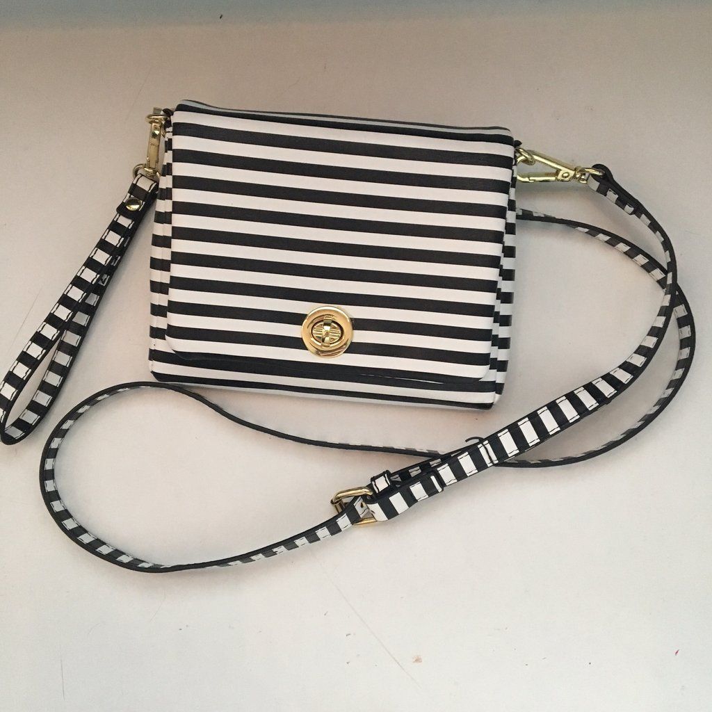 Excellent condition. Black and white striped shoulder bag. Like new